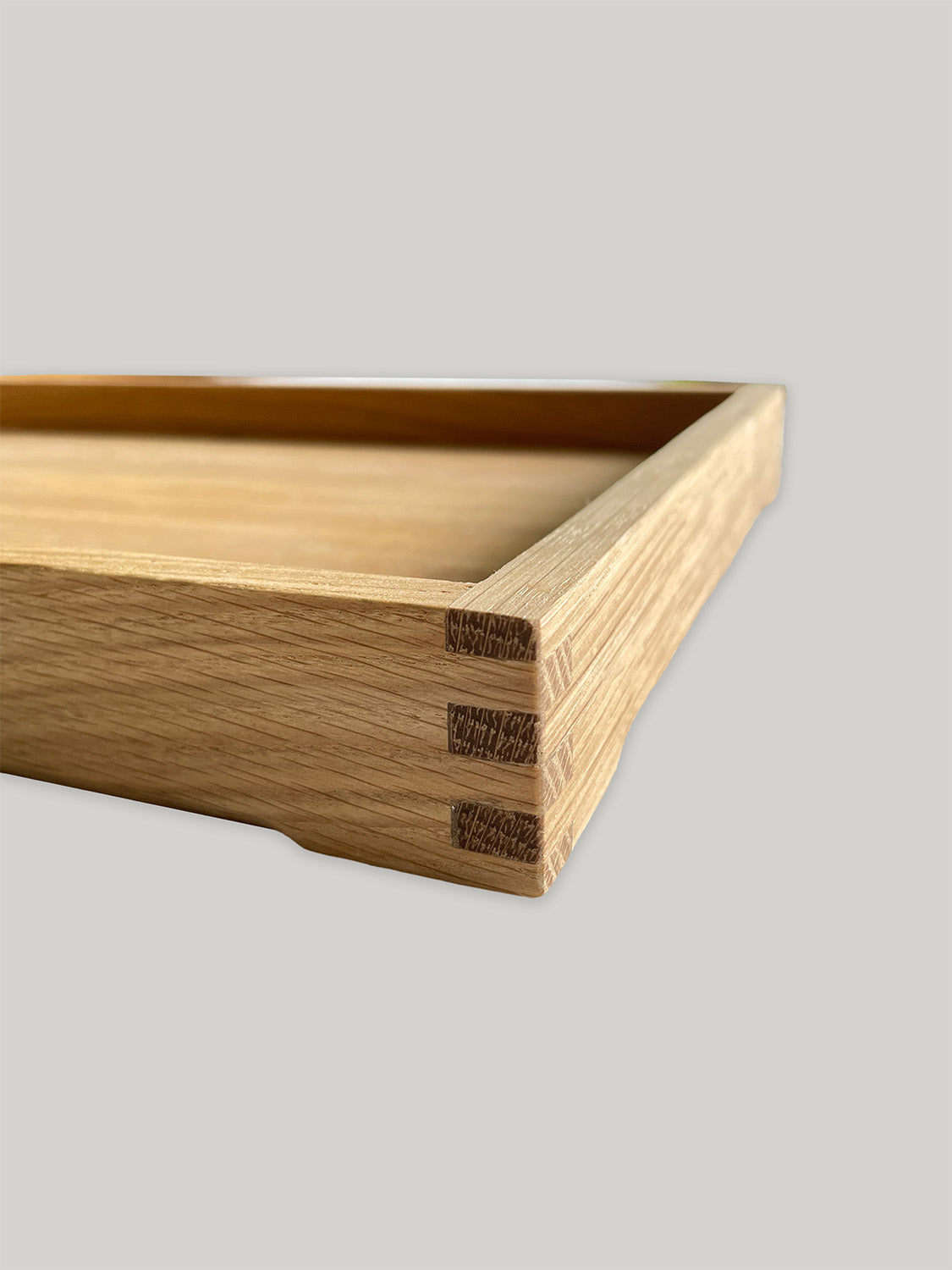 Handmade rectangular oak tray - corner detail.
