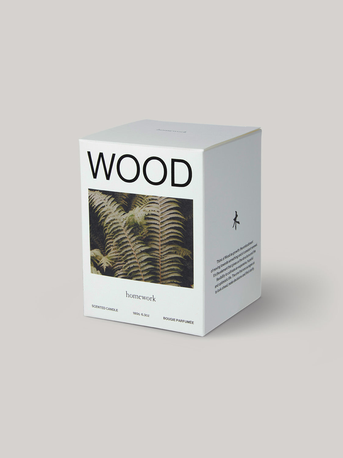 Box labelled 'WOOD' with fern image on a neutral background.