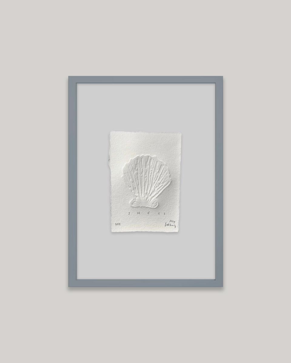 Shell hand-embossed artwork framed with pale blue mount.