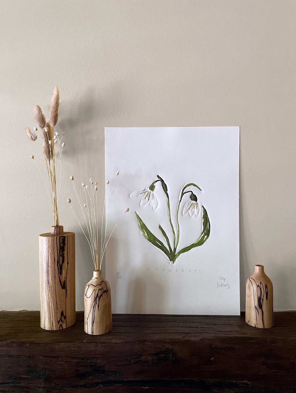 Snowdrops embossing, drawing and collage with wooden bud vases.