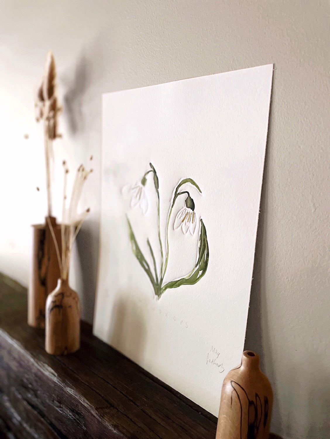 Snowdrops embossing, drawing and collage with wooden bud vases.