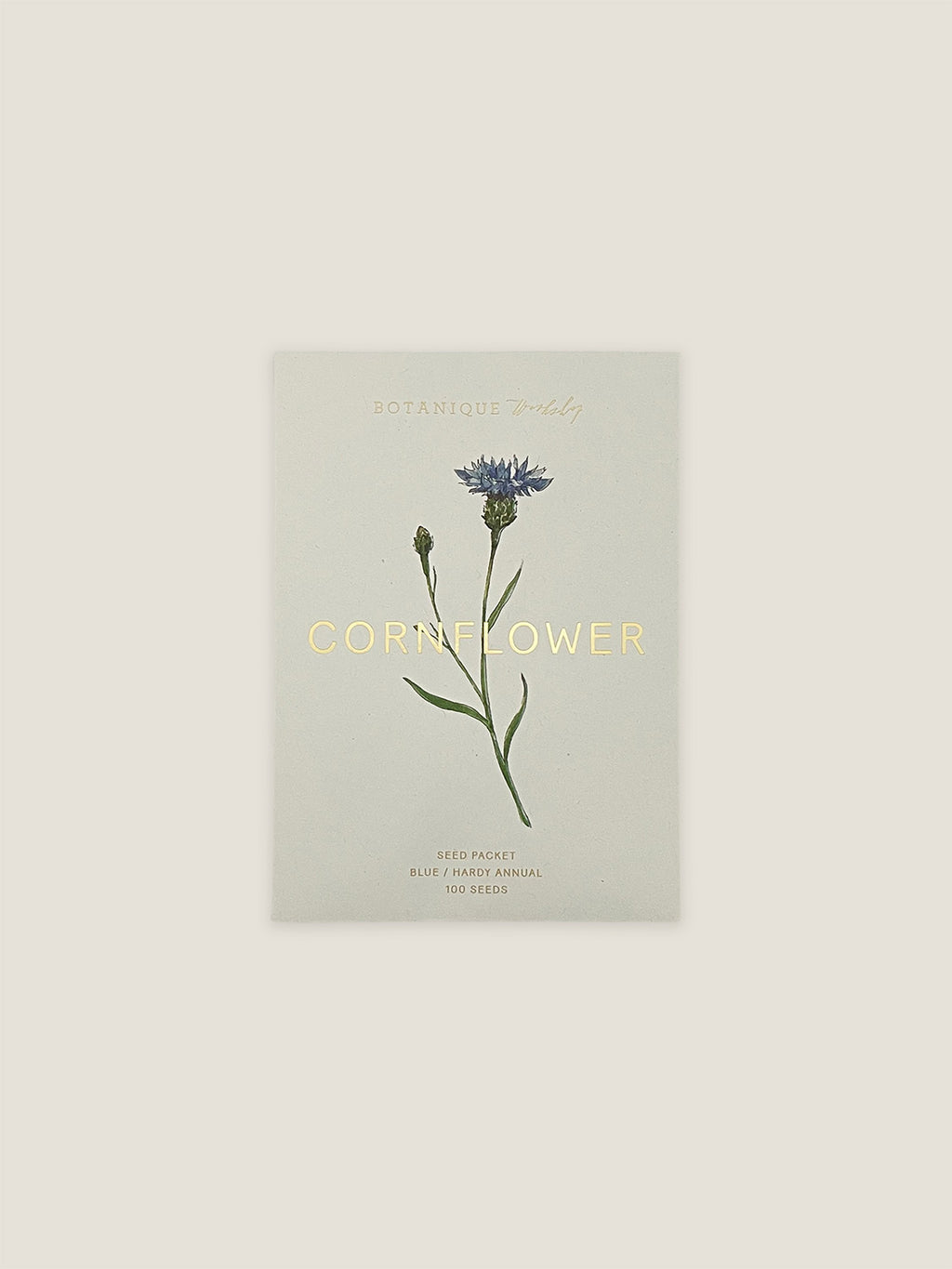 Cornflower seed packet with botanical illustration on a neutral background.