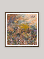Abstract art print with warm colours in dark oak frame on a neutral background.
