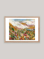 Abstract art print with vibrant colours in oak frame on a neutral background.