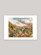 Abstract art print with vibrant colours in white frame on a neutral background.