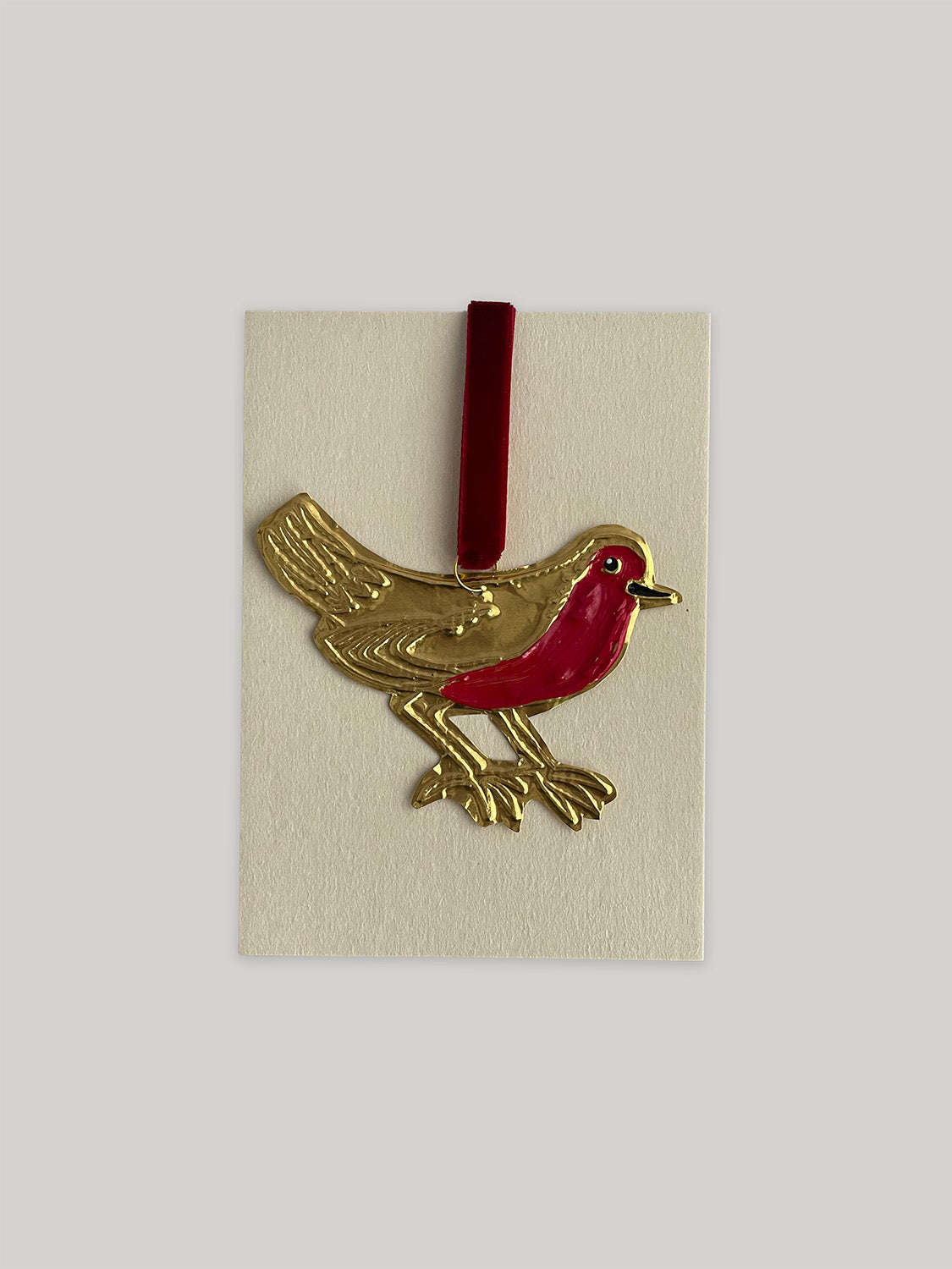 Gold tin robin handmade Christmas decoration with red velvet ribbon with packaging.