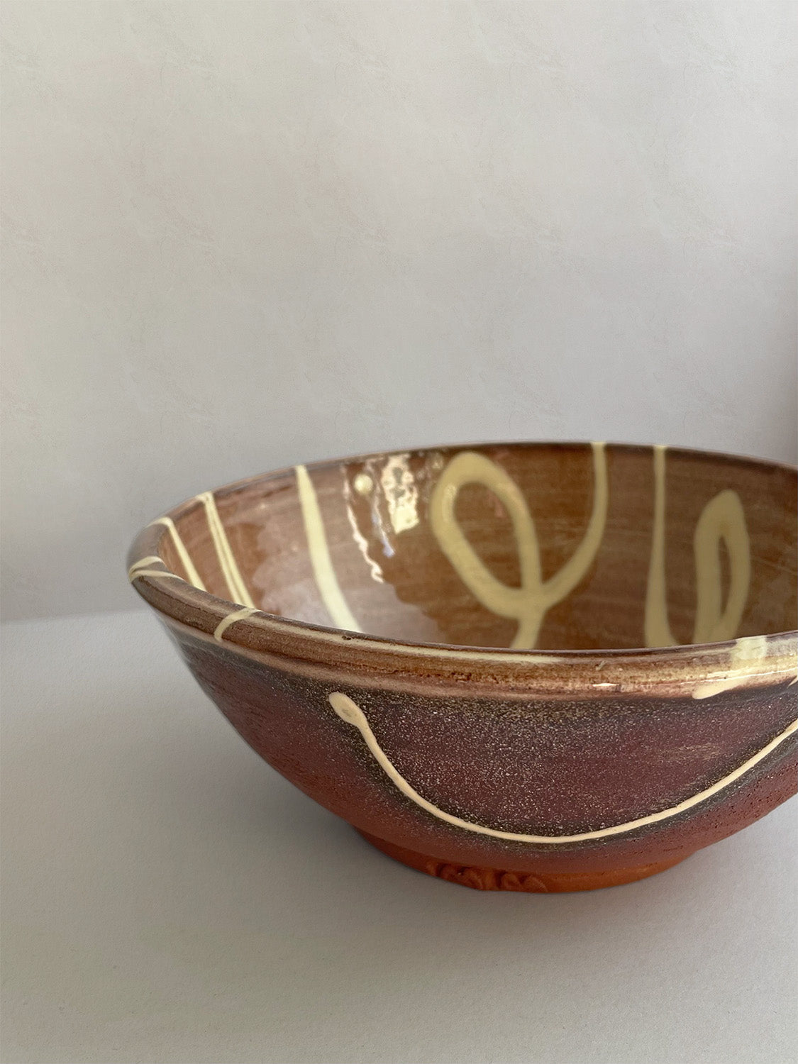 Handmade slipware breakfast bowl - front detail.