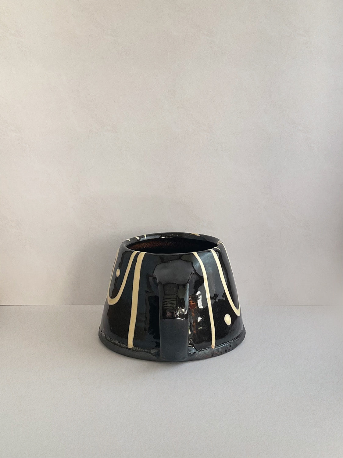 Handmade slipware mug - back.
