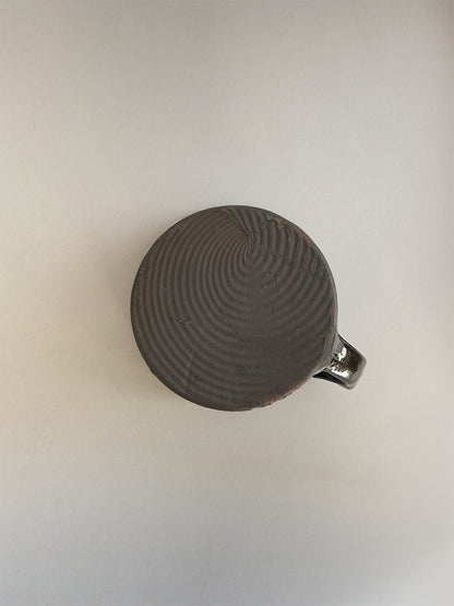 Handmade slipware mug - base.