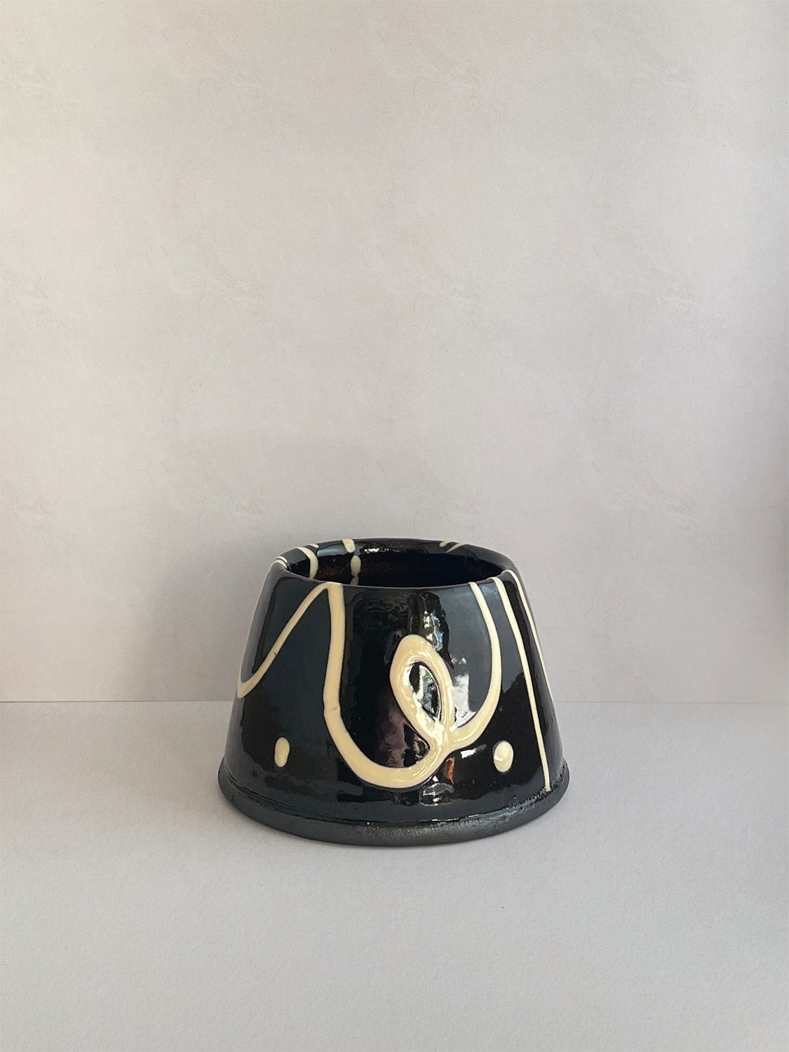 Handmade slipware mug - front.