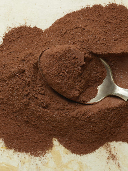 Hot chocolate powder with spoon.