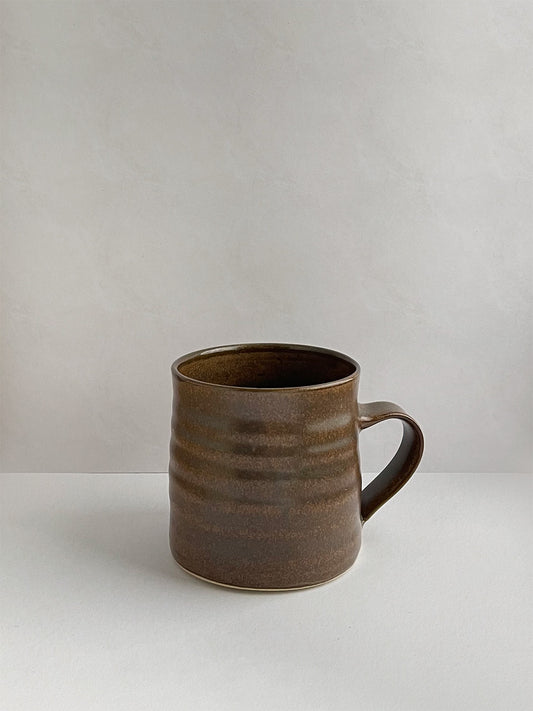 Mottled Brown ceramic mug - front.