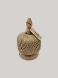 Solid oak twine holder with ball of jute twine and Kraft paper label on a neutral background.