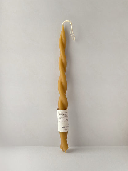 Organic beeswax hand-dipped twisted candle - front.