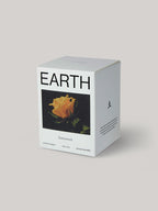 Box labelled 'EARTH' with a flower design on a neutral background.