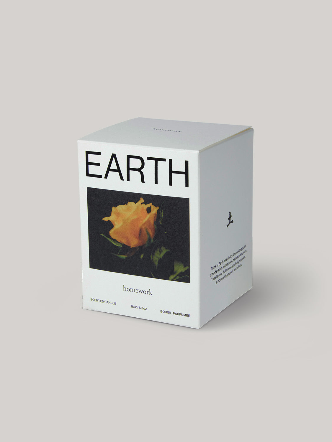 Box labelled 'EARTH' with a flower design on a neutral background.