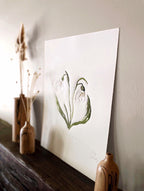 Snowdrops embossing, drawing and collage with wooden bud vases.