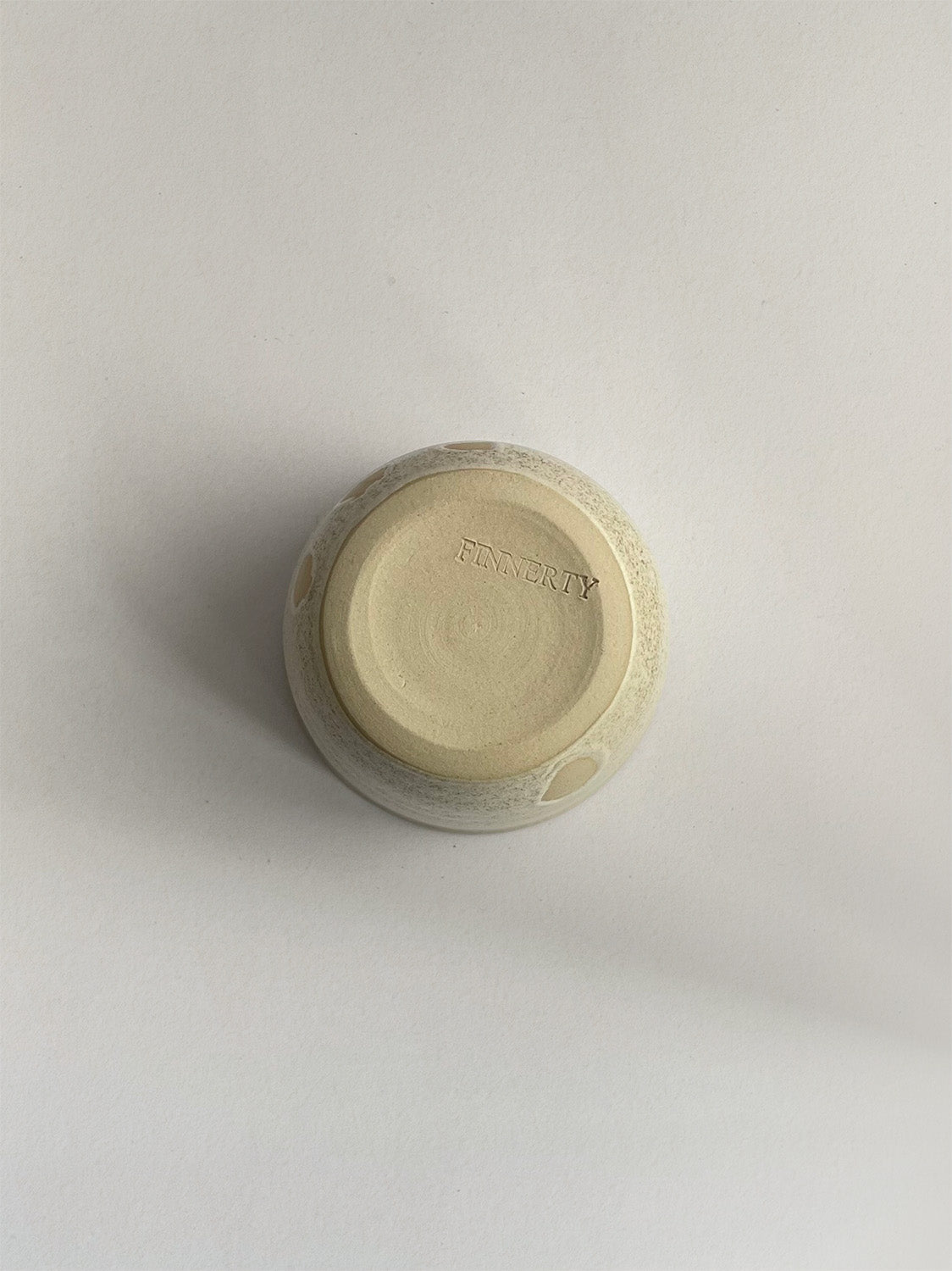 Stone Speckle ceramic coffee cup - base.