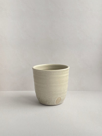 Stone Speckle ceramic coffee cup - front.