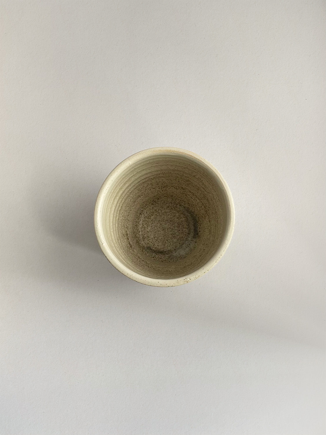 Stone Speckle ceramic coffee cup - top.