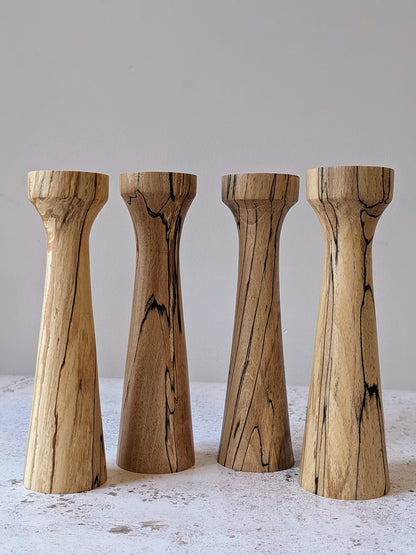 Two pairs of tall, tapered wooden candle holders in Spalted Beech - front.