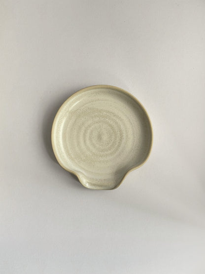 Warm White Speckle ceramic spoon rest - top.