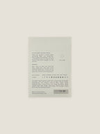 Back of Wildflower Meadow seed packet with text and growing instructions on a neutral background.