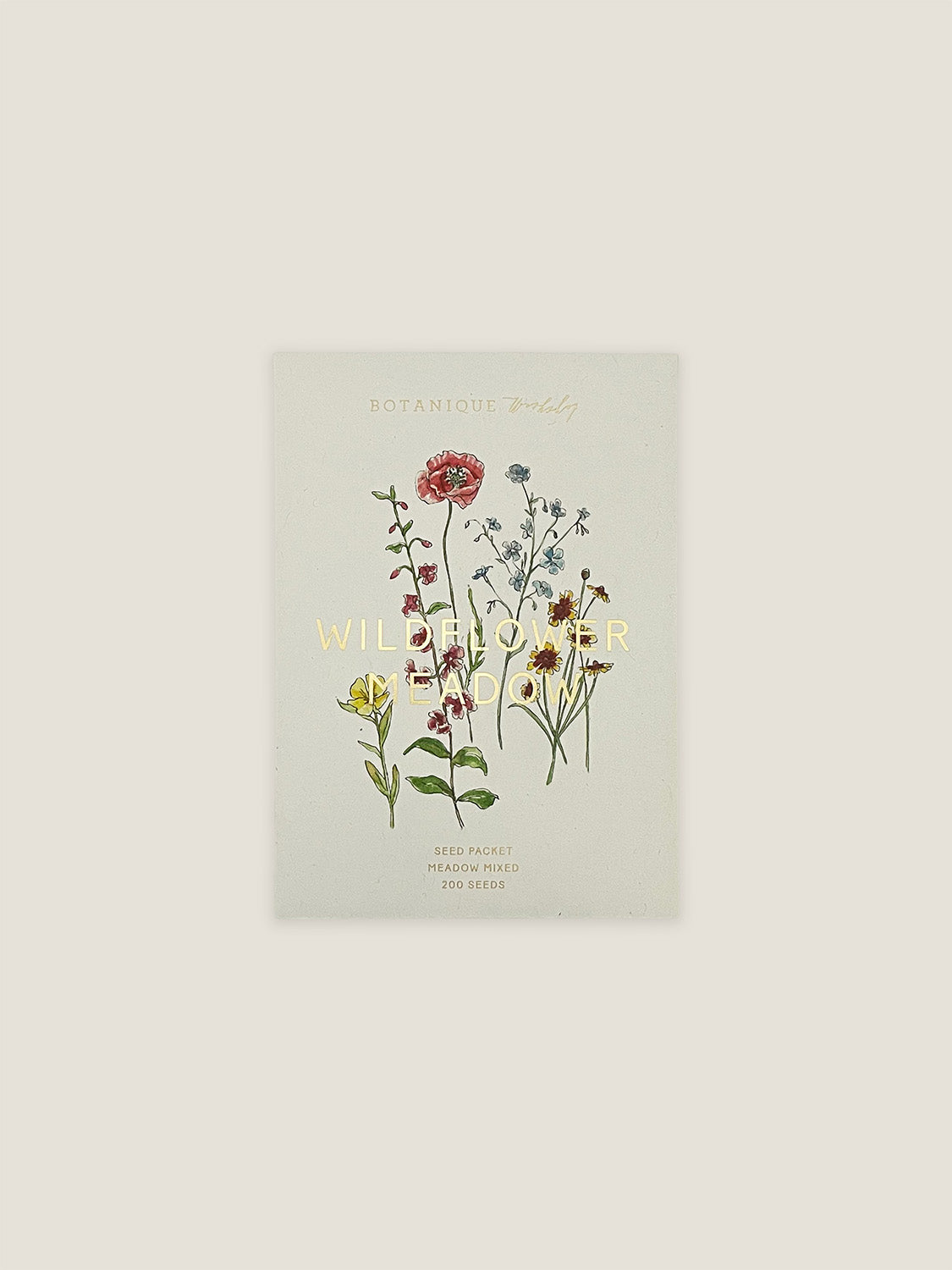 Wildflower Meadow seed packet with botanical illustration on a neutral background.