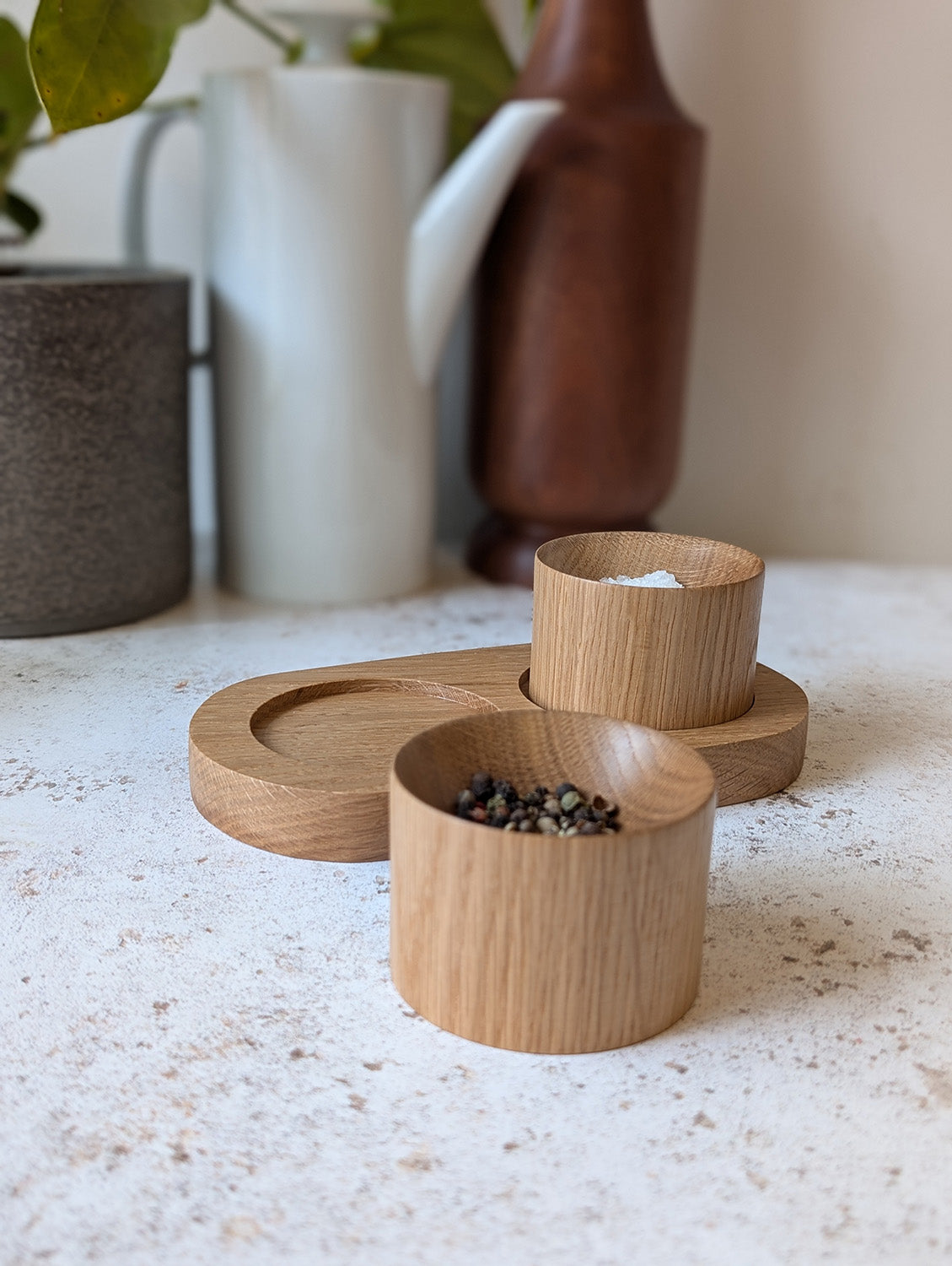 Wooden pinch pot set in English oak - front.